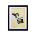Stratton Home Decor Movie Light and Clapboard Framed Wall Art Under Glass