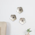 Stratton Home Decor Silver Metal Wall Flowers (Set of 3)
